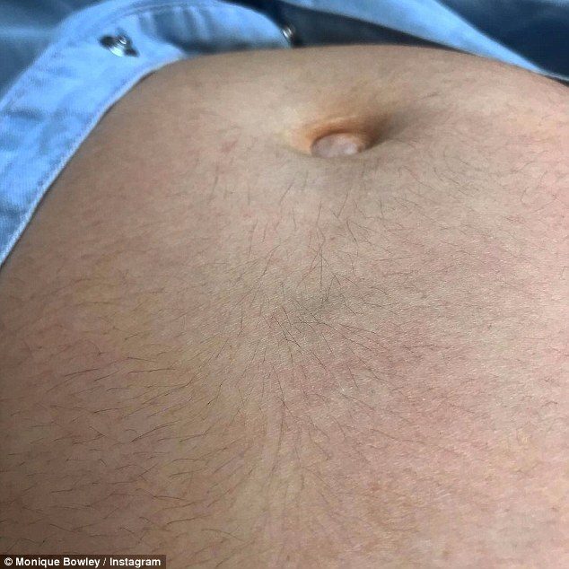 4E1AE9D100000578-5940335-Monique_Bowley_shared_a_photo_of_her_baby_bump_jokingly_saying_t-a-1_1531274253272