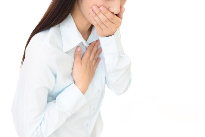 体調不良の女性