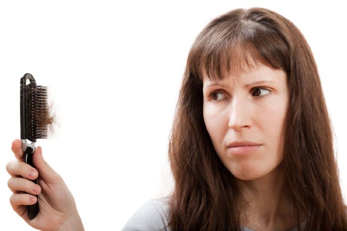 caduta capelli menopausa