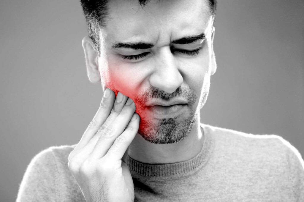 Cosa fare se un dente dondola e fa male?