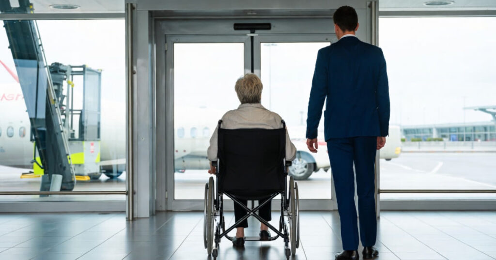 Sedia a rotelle in aereo